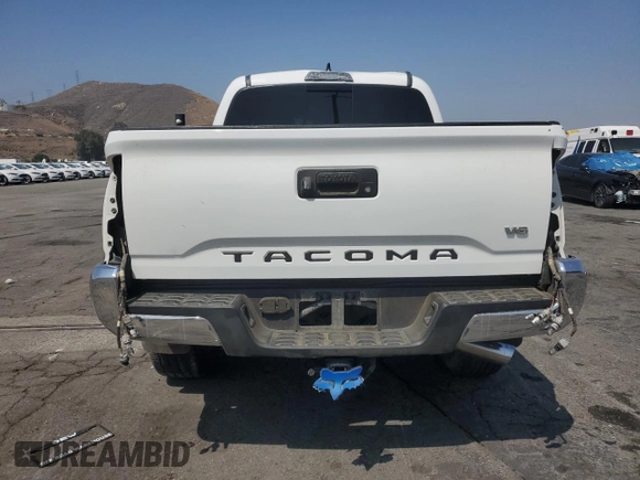 2017 Toyota Tacoma SR5 with VIN 3TMCZ5AN7HM065026, listed as a Copart auction lot 60438365 with 122,329 mi miles and Salvage title. Bid and sale history available at DreamBid. Image 6.