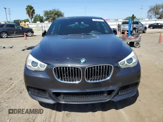 2014 BMW 5 Series GT 535i with VIN WBA5M2C55ED871907, listed as a Copart auction lot 73001564 with 90,576 mi miles and Salvage Title. Bid and sale history available at carsss.com. Image 5.