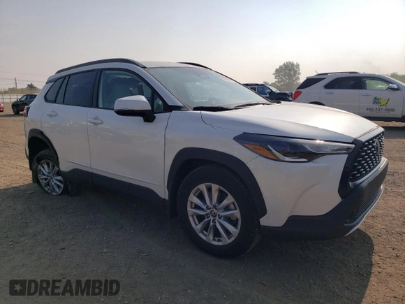 2023 Toyota Corolla Cross LE with VIN 7MUCAABG3PV060880, listed as a Copart auction lot 59664915 with 18,246 mi miles and Salvage title. Bid and sale history available at DreamBid. Image 4.