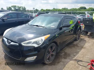 2013 Hyundai Veloster w/Black Int с VIN KMHTC6ADXDU084704, выставлен на аукционе IAAI как лот 42443297 с пробегом 111 587 миль миль и . История ставок и продаж доступна на DreamBid. Изображение 6.