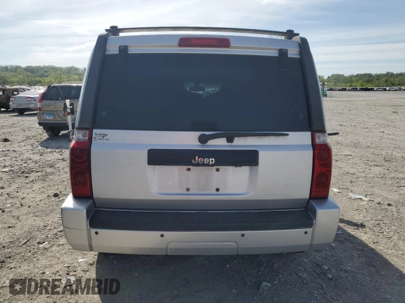 2010 Jeep Commander Sport with VIN 1J4RH4GK0AC139599, listed as a Copart auction lot 54235695 with 241,414 mi miles and Clean Title. Bid and sale history available at DreamBid. Image 6.