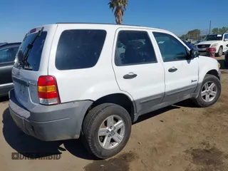 2006 Ford Escape Hybrid with VIN 1FMCU96H16KA61854, listed as a IAAI auction lot 42580035 with 264,173 mi miles and . Bid and sale history available at DreamBid. Image 4.