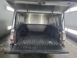 2013 Toyota Tacoma with VIN 5TFTX4CN0DX023945, listed as a IAAI auction lot 42848918 with 322,066 mi miles and . Bid and sale history available at DreamBid. Image 13.