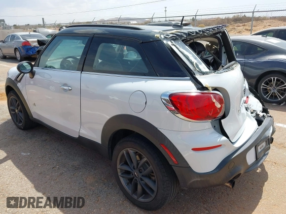 2013 MINI Paceman S ALL4 with VIN WMWSS7C51DWN51802, listed as a IAAI auction lot 41885786 with 96,386 mi miles and . Bid and sale history available at DreamBid. Image 3.