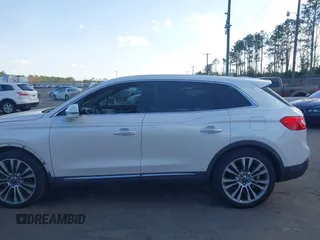 2018 Lincoln MKX Reserve with VIN 2LMPJ6LRXJBL20354, listed as a IAAI auction lot 41561022 with 138,688 mi miles. Bid and sale history available at carsss.com. Image 14.