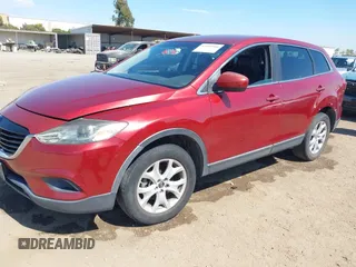2013 Mazda CX-9 Touring with VIN JM3TB2CV8D0410956, listed as a IAAI auction lot 42643918 with 187,045 mi miles and . Bid and sale history available at DreamBid. Image 2.