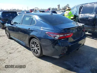 2021 Toyota Camry SE Nightshade with VIN 4T1G11AK6MU526029, listed as a IAAI auction lot 41626272 with 82,987 mi miles and . Bid and sale history available at DreamBid. Image 3.