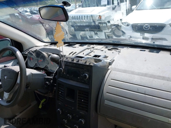 2008 Dodge Grand Caravan SE with VIN 1D8HN44H78B167114, listed as a IAAI auction lot 42542391 with 170,153 mi miles and . Bid and sale history available at DreamBid. Image 12.