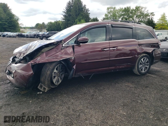 2015 Honda Odyssey Touring Elite with VIN 5FNRL5H98FB033336, listed as a Copart auction lot 57092355 with 186,046 mi miles and Salvage title. Bid and sale history available at DreamBid. Image 1.