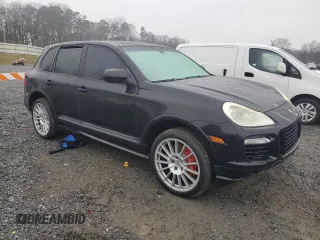 2009 Porsche Cayenne Turbo with VIN WP1AC29P69LA83418, listed as a Copart auction lot 87115384 with 129,437 mi miles and Clean Title. Bid and sale history available at carsss.com. Image 4.