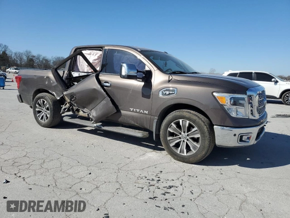 2017 Nissan Titan SL with VIN 1N6AA1E6XHN536809, listed as a Copart auction lot 47956345 with 135,207 mi miles and Salvage title. Bid and sale history available at DreamBid. Image 4.