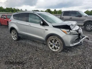 2013 Ford Escape Titanium with VIN 1FMCU9J94DUB00695, listed as a Copart auction lot 56633955 with 129,011 mi miles and Salvage title. Bid and sale history available at DreamBid. Image 4.