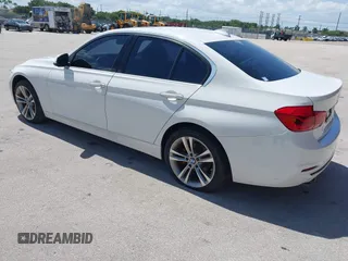 2018 BMW 3 Series 330i with VIN WBA8B9G52JNU57283, listed as a IAAI auction lot 42042507 with 51,740 mi miles and . Bid and sale history available at DreamBid. Image 3.