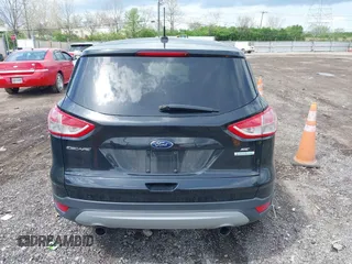 2013 Ford Escape SE with VIN 1FMCU0GX1DUA99040, listed as a IAAI auction lot 42084787 with 140,473 mi miles and . Bid and sale history available at DreamBid. Image 16.