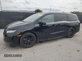 2023 Honda Odyssey Sport z VIN 5FNRL6H77PB080220, wystawiony jako Copart lot #59157835 z przebiegiem 34 575 mil mil oraz Czysty tytuł • Clean title. Historia ofert i sprzedaży dostępna na DreamBid. Obrazek 1.