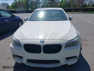 2013 BMW M5 with VIN WBSFV9C58DC773268, listed as a IAAI auction lot 41890830 with 128,399 mi miles. Bid and sale history available at carsss.com. Image 12.