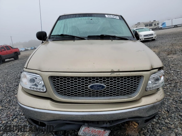 1999 Ford F-150 XL with VIN 1FTRX18L7XNB64656, listed as a Copart auction lot 84610454 with 0 mi miles and Salvage Title. Bid and sale history available at carsss.com. Image 5.