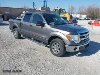 2013 Ford F-150 XL with VIN 1FTFW1CT5DFA98921, listed as a IAAI auction lot 41789209 with 272,201 mi miles. Bid and sale history available at carsss.com. Image 1.