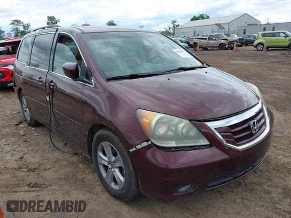 2009 Honda Odyssey Touring with VIN 5FNRL38929B037150, listed as a IAAI auction lot 42319657 with 183,663 mi miles and . Bid and sale history available at DreamBid. Image 1.