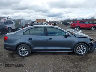 2014 Volkswagen Jetta SE z VIN 3VWD17AJ9EM358777, wystawiony jako IAAI lot #41880077 z przebiegiem 161 985 mil mil oraz . Historia ofert i sprzedaży dostępna na DreamBid. Obrazek 14.