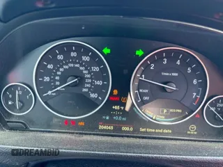 2014 BMW 3 Series 320i xDrive z VIN WBA3C3C54EP662334, wystawiony jako Copart lot #48041315 z przebiegiem 204 045 mil mil oraz Szkoda całkowita • Salvage title. Historia ofert i sprzedaży dostępna na DreamBid. Obrazek 9.