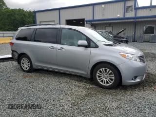 2016 Toyota Sienna XLE with VIN 5TDYK3DC8GS715148, listed as a Copart auction lot 57834045 with 128,769 mi miles and Salvage title. Bid and sale history available at DreamBid. Image 4.