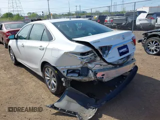 2015 Toyota Camry XLE with VIN 4T1BF1FK1FU977554, listed as a IAAI auction lot 42083589 with 104,811 mi miles and . Bid and sale history available at DreamBid. Image 3.