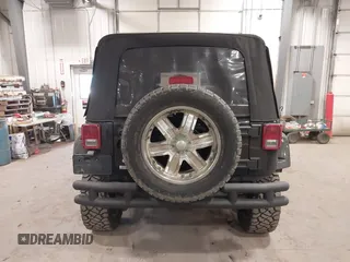 2008 Jeep Wrangler Unlimited X with VIN 1J4GA391X8L558984, listed as a IAAI auction lot 41016498 with 123,308 mi miles. Bid and sale history available at carsss.com. Image 16.