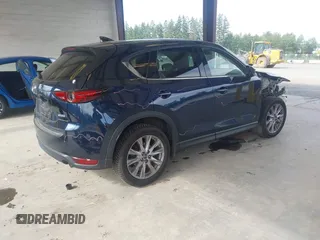 2019 Mazda CX-5 Grand Touring with VIN JM3KFBDM6K0522903, listed as a IAAI auction lot 42583005 with 61,174 mi miles and . Bid and sale history available at DreamBid. Image 4.