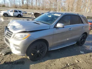 2012 Mercedes-Benz M 550 with VIN 4JGDA7DB9CA049890, listed as a Copart auction lot 82862974 with 117,355 mi miles and Salvage title. Bid and sale history available at DreamBid. Image 1.