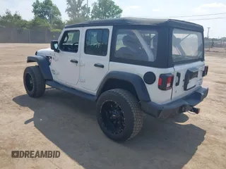 2018 Jeep Wrangler Unlimited Sport S with VIN 1C4HJXDG7JW150038, listed as a IAAI auction lot 42519194 with 113,300 mi miles and . Bid and sale history available at DreamBid. Image 3.