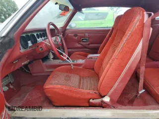 1980 Pontiac Firebird z VIN 2V87TAL116556, wystawiony jako Copart lot #64086644 z przebiegiem 15 342 mil mil oraz Szkody całkowita. Historia ofert i sprzedaży dostępna na DreamBid. Obrazek 7.