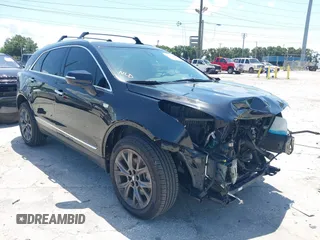 2020 Cadillac XT5 Luxury FWD with VIN 1GYKNAR47LZ239819, listed as a IAAI auction lot 42600145 with 64,311 mi miles and . Bid and sale history available at DreamBid. Image 1.