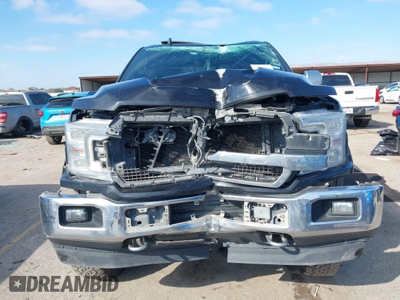 2018 Ford F-150 XL z VIN 1FTEW1EG9JFC27573, wystawiony jako IAAI lot #41626805 z przebiegiem 153 814 mil mil oraz . Historia ofert i sprzedaży dostępna na DreamBid. Obrazek 12.