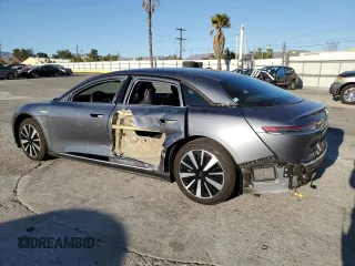 2023 Lucid Air Pure with VIN 50EA1PFA0PA006410, listed as a Copart auction lot 89054185 with 13,605 mi miles and Salvage Title. Bid and sale history available at carsss.com. Image 2.
