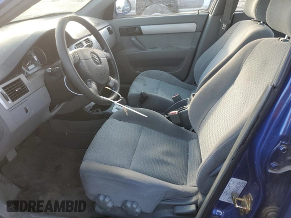 2006 Suzuki Forenza z VIN KL5JD56Z96K478173, wystawiony jako Copart lot #87059644 z przebiegiem 234 059 mil mil oraz Szkoda całkowita • Salvage title. Historia ofert i sprzedaży dostępna na DreamBid. Obrazek 7.