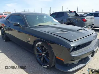 2019 Dodge Challenger R/T Scat Pack z VIN 2C3CDZFJ0KH730791, wystawiony jako IAAI lot #41938481 z przebiegiem 48 713 mil mil oraz . Historia ofert i sprzedaży dostępna na DreamBid. Obrazek 1.