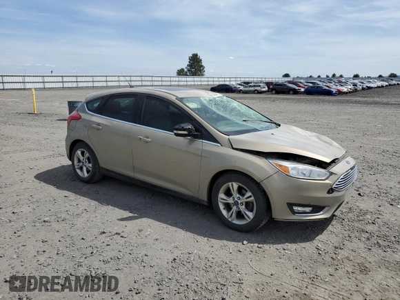 2017 Ford Focus Titanium with VIN 1FADP3N24HL279705, listed as a Copart auction lot 60169005 with 80,146 mi miles and Salvage title. Bid and sale history available at DreamBid. Image 4.