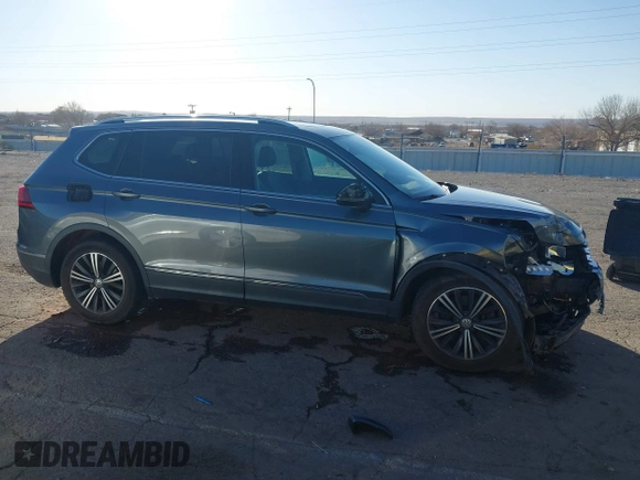 2018 Volkswagen Tiguan SEL z VIN 3VV3B7AXXJM088230, wystawiony jako IAAI lot #41680855 z przebiegiem 130 807 mil mil oraz . Historia ofert i sprzedaży dostępna na DreamBid. Obrazek 13.