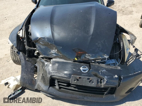 2013 Nissan 370Z Touring z VIN JN1AZ4EH4DM881576, wystawiony jako Copart lot #50645635 z przebiegiem 123 515 mil mil oraz Szkoda całkowita • Salvage title. Historia ofert i sprzedaży dostępna na DreamBid. Obrazek 12.