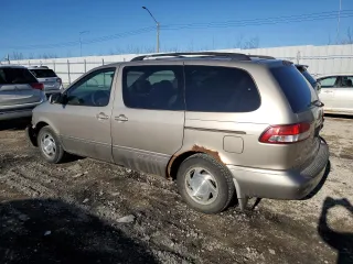 2001 Toyota Sienna LE with VIN 4T3ZF13C91U325132, listed as a Copart auction lot 52821605 with 382,472 mi miles and Salvage Title. Bid and sale history available at carsss.com. Image 2.