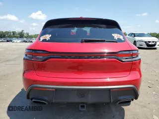 2023 Porsche Macan with VIN WP1AA2A54PLB07597, listed as a Copart auction lot 64077345 with 50,704 mi miles and Salvage title. Bid and sale history available at DreamBid. Image 6.