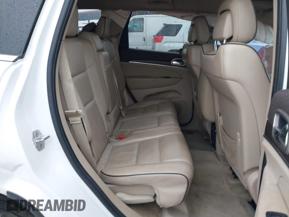 2014 Jeep Grand Cherokee Overland with VIN 1C4RJFCG9EC162098, listed as a IAAI auction lot 41746022 with 120,588 mi miles and . Bid and sale history available at DreamBid. Image 8.