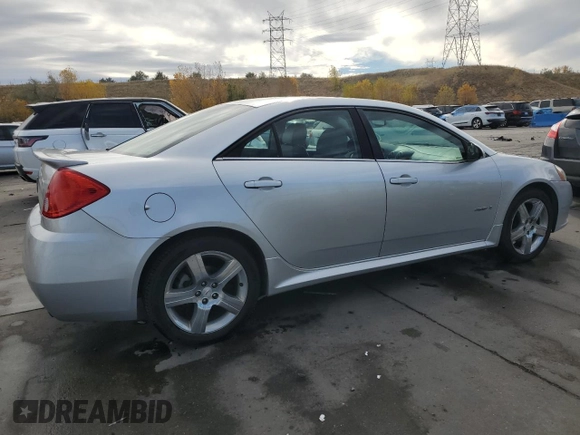 2009 Pontiac G6 with VIN 1G2ZL577094232011, listed as a Copart auction lot 77175054 with 133,353 mi miles and Salvage title. Bid and sale history available at DreamBid. Image 3.