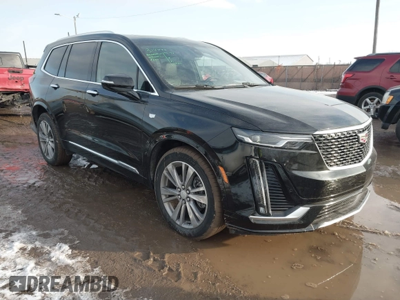2025 Cadillac XT6 FWD Premium Luxury with VIN 1GYKPCRS6SZ104902, listed as a IAAI auction lot 41565224 with 4,735 mi miles and . Bid and sale history available at DreamBid. Image 1.