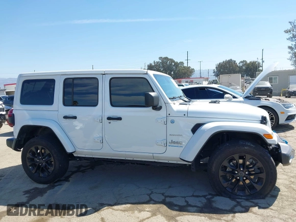 2024 Jeep Wrangler Sahara with VIN 1C4RJXP61RW126904, listed as a IAAI auction lot 41998215 with 32,034 mi miles and . Bid and sale history available at DreamBid. Image 13.