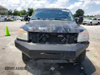 2011 Nissan Titan Pro-4X with VIN 1N6BA0EC6BN313680, listed as a Copart auction lot 60335995 with 241,301 mi miles and Salvage title. Bid and sale history available at DreamBid. Image 5.