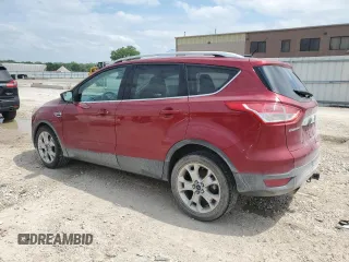2015 Ford Escape Titanium with VIN 1FMCU0J92FUC42929, listed as a Copart auction lot 59863845 with 226,265 mi miles and Salvage title. Bid and sale history available at DreamBid. Image 2.
