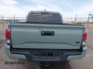 2022 Toyota Tacoma SR with VIN 3TMCZ5AN0NM507320, listed as a IAAI auction lot 42220296 with 33,342 mi miles and . Bid and sale history available at DreamBid. Image 16.