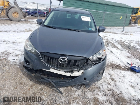 2013 Mazda CX-5 Sport z VIN JM3KE2BE9D0156274, wystawiony jako IAAI lot #41624466 z przebiegiem 159 017 mil mil oraz . Historia ofert i sprzedaży dostępna na DreamBid. Obrazek 6.
